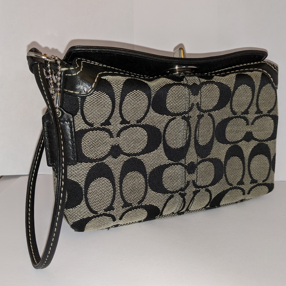 Black fabric and leather coach wristlet